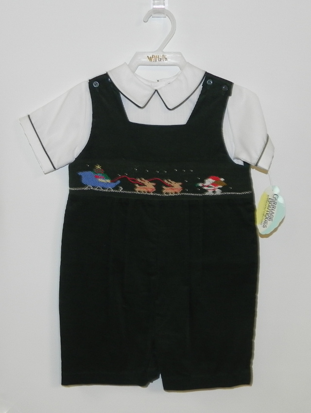 New! Carriage Boutiques size 4T two-piece outfit with green piped white short shirt and forest green corduroy short all with smocked Santa and sleigh. Our Price $40